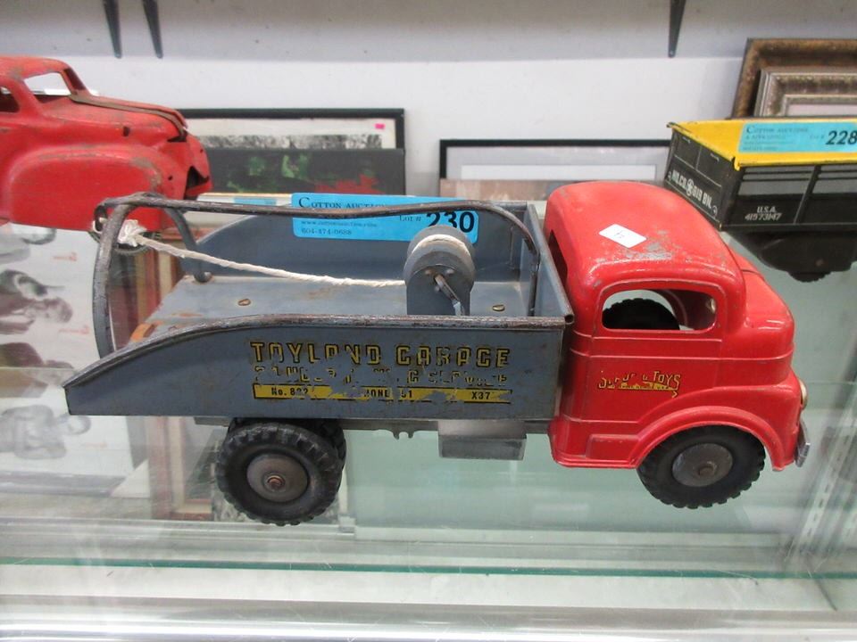 1950s Structo WindUp Toyland Garage Tow Truck