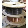 Image 1 : 2 ASSORTED ROLLS OF AIR LIQUIDE COILED WELDING