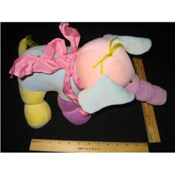 This colorful and very whimsical elephant throw plush toy is a beauty.