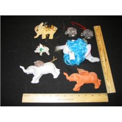 Here we have 7 hanging elephants. These guys hang around where ever you like, One is even a bath scr