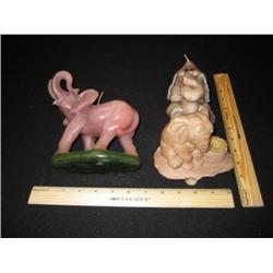 Three elephant candles, two are very cute and funny, burnable candles. The other is a votive candle 