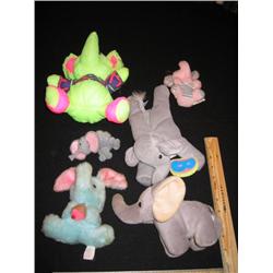 A second herd of 6 lovable elephants. This has a "Beanie Mommy" elephant, and one little guy roars w