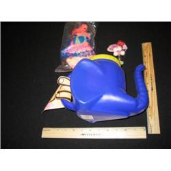 Three elephants, one is a pitcher, one is a bobble elephant stick-on. The last is and Avon collectab