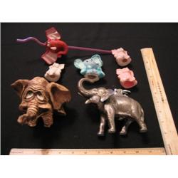 Seven elephants, one is a pewter gas lighter. We have a sipping straw elephant that also makes eleph