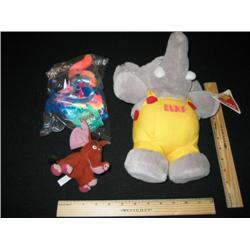 Three stuffed animals, one is an Avon collectable still in its' wrapper with tags. The little rust c