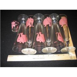 A set of 6 elephant beer glases and one elephant shot glass.