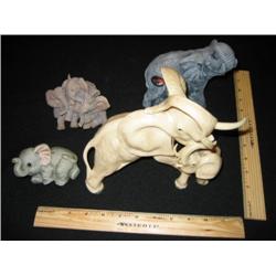 Four hand carved stone elephants, Two are large, two are medium, very nice