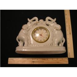 An elephant clock (large), white and gold.