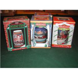 Four Budweiser Holiday Series Steins