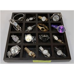 WATCH DISPLAY FILLED WITH WATCHES