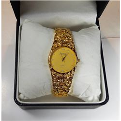 1)  LADIES FANCY GOLD TONE WATCH
