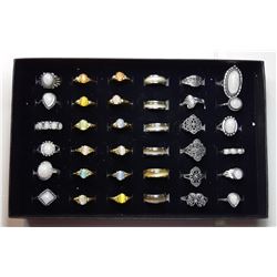7)  LOT OF 36 FASHION RINGS & DISPLAY CASE