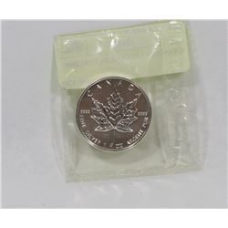 CANADIAN 5 DOLLAR SILVER COIN.