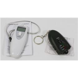 TWO ALCOHOL BREATH TESTERS