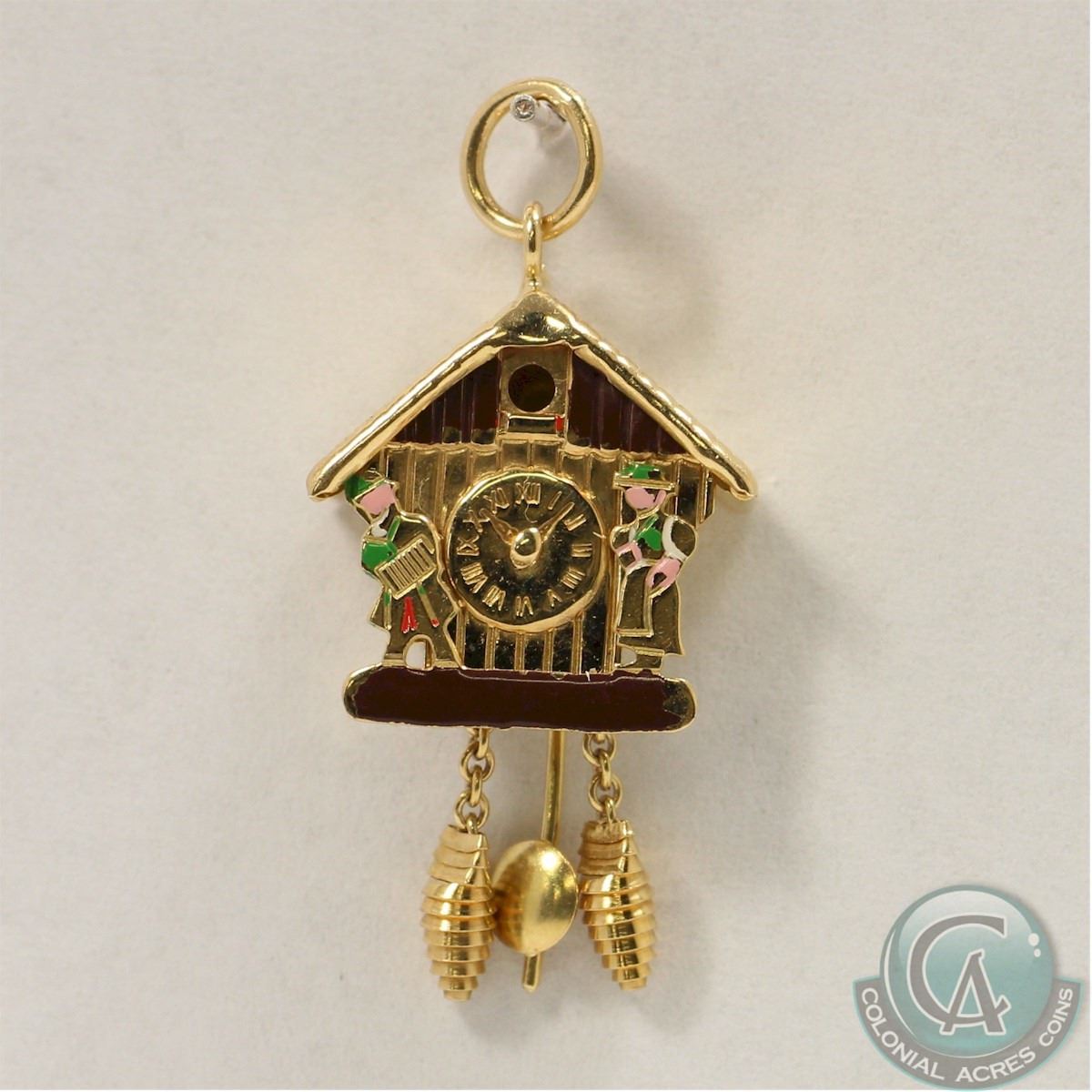 18K Yellow Gold Articulated Coo Coo Clock with Enamel finish. 2.6 grams.