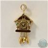 Image 1 : 18K Yellow Gold Articulated Coo Coo Clock with Enamel finish. 2.6 grams.