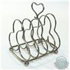 Image 1 : Antique Sterling Silver Toast Rack. Stands 4" in height and is 3 3/4" in Length.