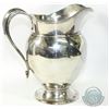 Image 1 : Graff, Washbourne & Dunn American Sterling Silver Pitcher. Stands 7 1/4" in Height. Contains some co