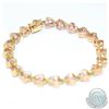 Image 2 : Lady's 14K Yellow Gold Heart Shaped Pink Tourmaline Bracelet.  Measures 7 1/2" in length  with a tot