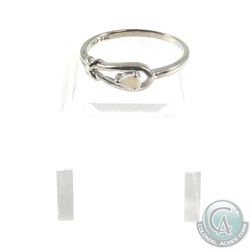 Lady's 10K White Gold Custom Ring with Opal Accent- Size 6 1/2. Total weight of 1.42 grams.