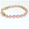 Image 1 : Lady's 14K Yellow Gold Heart Shaped Pink Tourmaline Bracelet.  Measures 7 1/2" in length  with a tot