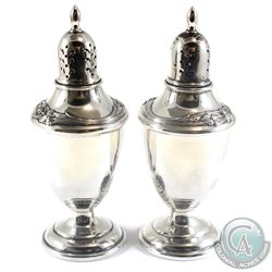 International Sterling Silver Salt & Pepper Shakers with Silver Iris Design.  Measures 5 " in height