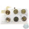 Image 1 : 2012 Canada $1 and $2 Circulation Coins and Test Token Set.  Outer envelope has a small tear.