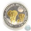Image 1 : 2014 Somali Republic 1oz Gold Plated Elephant Fine Silver Coin in Capsule (Scratched capsule). (TAX 