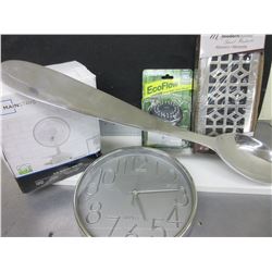 Box full of Assorted Items/ waterpic shower head / clock / fan / large wall