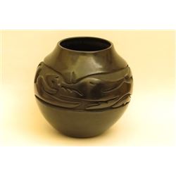 Vintage  Black- wear with carved Avanyu design. Tafoya