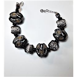 16)  BLACK, SILVER & GOLD TONE  EMBELLISHED