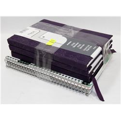 BUNDLE OF JOURNALS AND COILED BOOKS