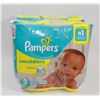 Image 1 : 2 BAGS OF SIZE 3 PAMPERS SWADDLERS.