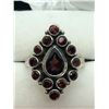 Image 1 : 76) STERLING SILVER GARNET RING