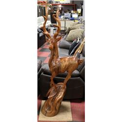 SOLID WOOD DEER CARVING APPROX 4FT HIGH.