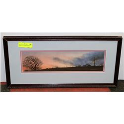 FRAMED PICTURE OF CATTLE AT SUNSET.