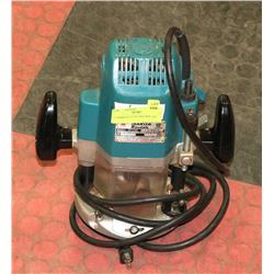 11) MAKITA 1/2" PLUNGE ROUTER.