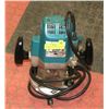 Image 1 : 11) MAKITA 1/2" PLUNGE ROUTER.