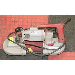 8) MILWAUKEE HEAVY DUTY BAND SAW.