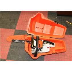 77) STIHL SMALL CHAIN SAW AND CASE.