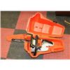 Image 1 : 77) STIHL SMALL CHAIN SAW AND CASE.
