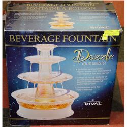 BEVERAGE FOUNTAIN BUBBLES AND COLORED LIGHTS.