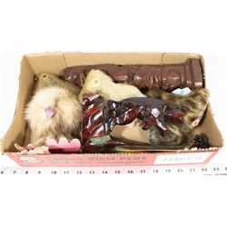 FLAT OF TOTEM POLES AND FUR ANIMALS