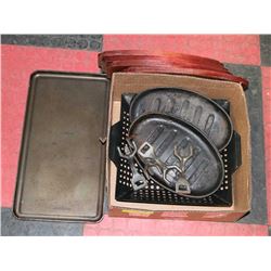 LOT OF CAST IRON GRILL AND WOOD PLATES WITH HOOKS.