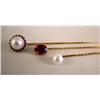 Image 1 : THREE GOLD STICK PINS comprising: one with collet-set oval faceted ruby, weighing apx. .30 ct., a 9m