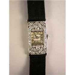 AN ART DECO LADY'S DIAMOND WRIST WATCH
