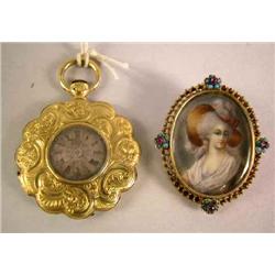 A VICTORIAN SWISS YELLOW GOLD CIRCULAR SCALLOPED CASED LAPEL WATCH