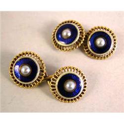 A YELLOW GOLD AND BLUE ENAMEL CIRCULAR DOUBLE HEADED CUFFLINK SET