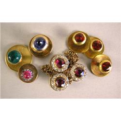 THREE YELLOW GOLD STUDS