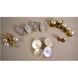 A PAIR OF 14K YELLOW GOLD OVAL DOUBLE HEADED CUFFLINKS